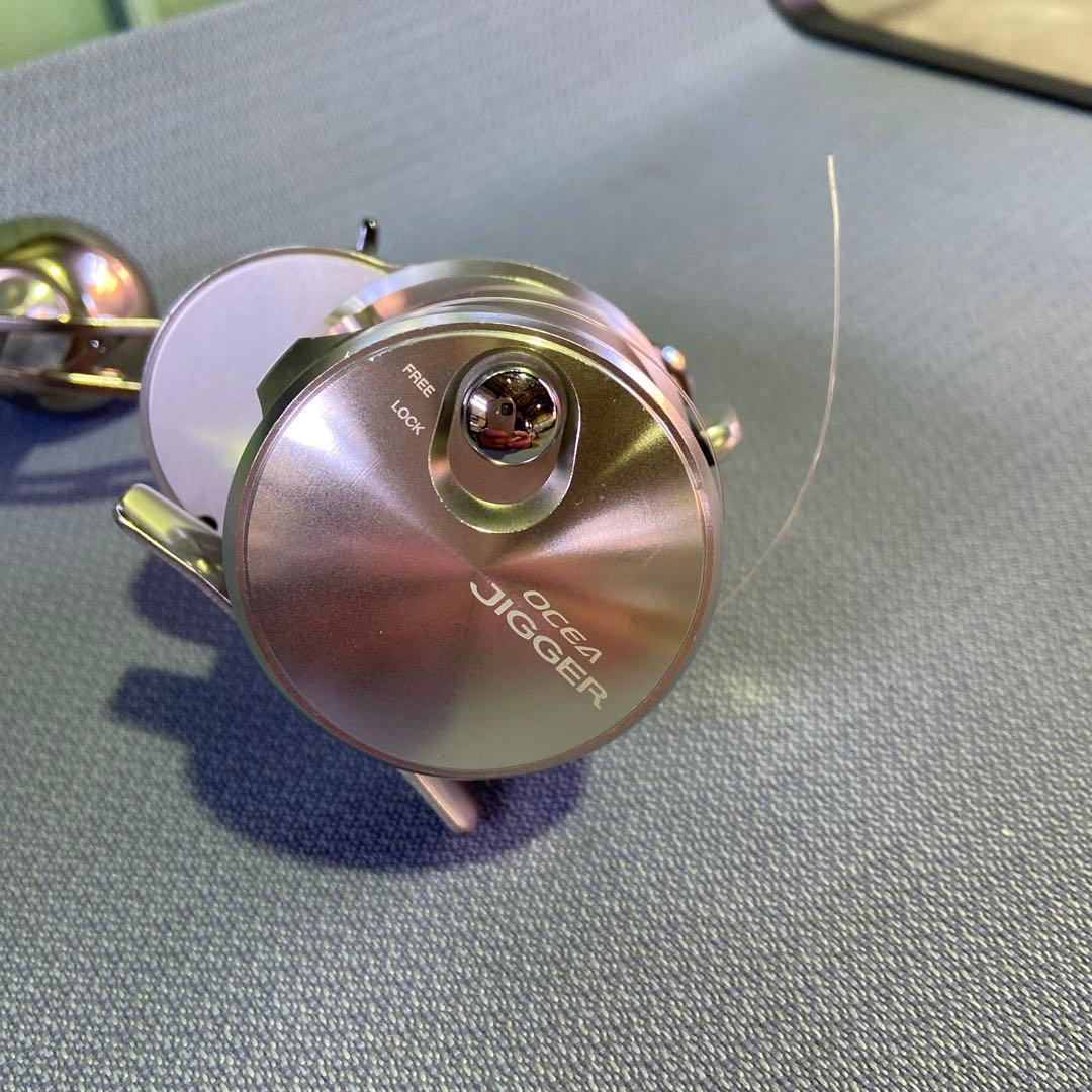 オシア ジガー ベイトリール マルチカラーライン付きゴメクサスハンドル付き